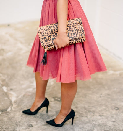 Salmon Bella Sweet Pea skirt featuring a flowing fabric with floral pattern, stylish and perfect for casual or dressy occasions.