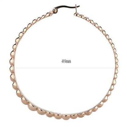 Rose gold stainless steel earrings with a sleek, minimalist design by Turquoise Tiger, showcasing elegant jewelry style.