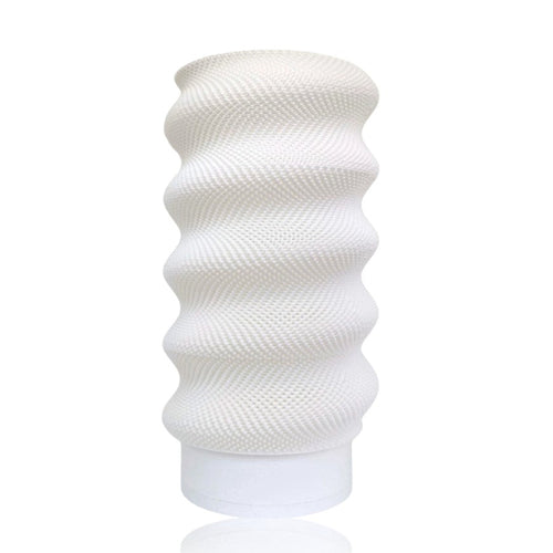 White Lumina Twist portable table lamp by Azure Pontus with a modern, twist-designed lighting fixture on a sleek surface.