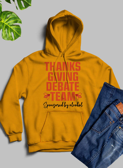 Black Thanksgiving Debate Team Hoodie by Jade Thalassa featuring festive design, cozy fabric, and comfortable fit.