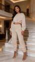 Beige teddy borg cropped top and jogger lounge set from Fuchsia Erebus, shown in a stylish image.