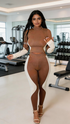 Image of Fuchsia Erebus activewear set with long sleeve crop top and high waist leggings, designed for workout and casual wear.