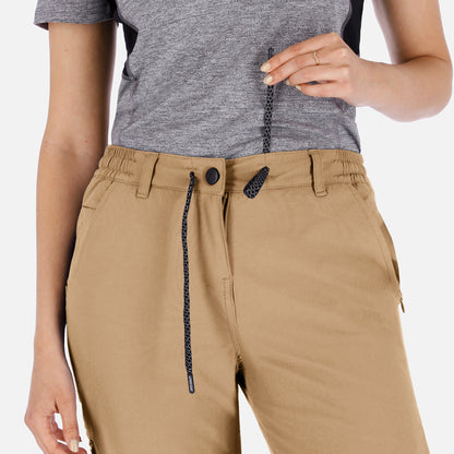 Women’s beige adventure pants by Rose Hemera, long activewear trousers with a relaxed fit and comfortable design.
