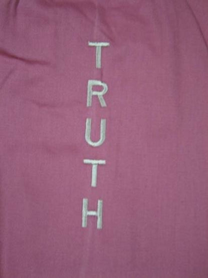 Alabaster OMSutra yoga bag with slogan design, durable fabric, and adjustable strap for carrying yoga mats and accessories.