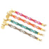 Colorful Twilight bracelet by Yellow Athena featuring pink, orange, blue, and gold tones in a stylish jewelry design.