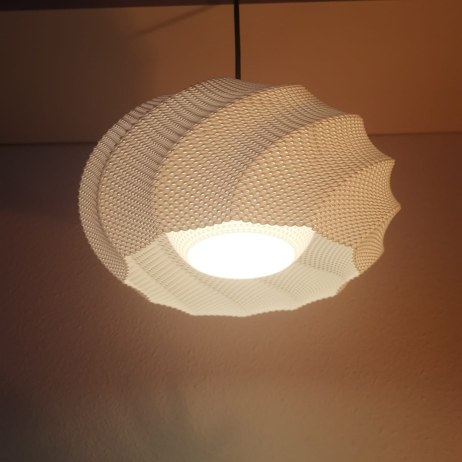 Azure Pontus Twist Glow pendant lamp with a modern, sculptural design and glowing LED light for stylish home lighting.