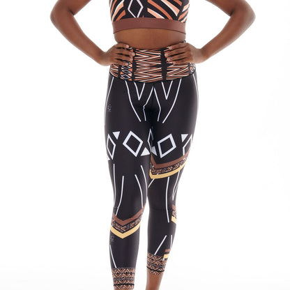 White Oliver Ibeekay Splash leggings, vibrant activewear with colorful splash pattern, close-up view of stretchy fabric and design details.