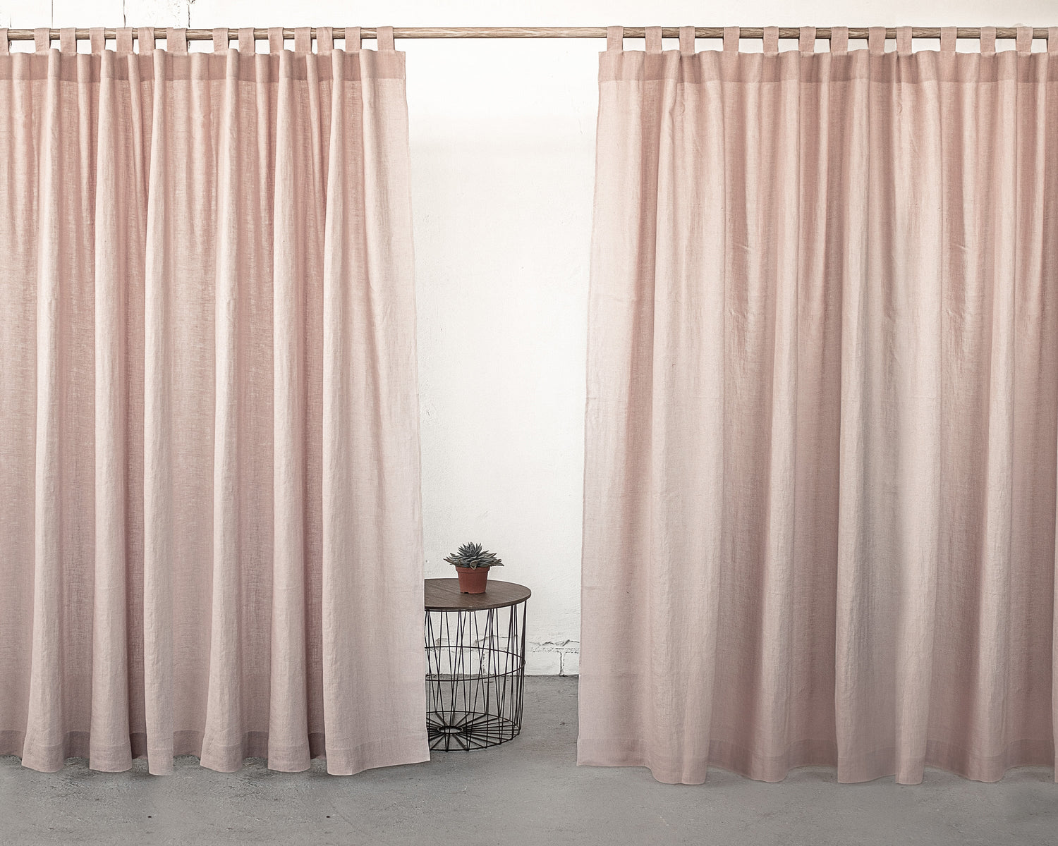 Dark plum linen curtain with tab top design from Magenta Sugarplum, showcasing its rich color and textured fabric for home decor.