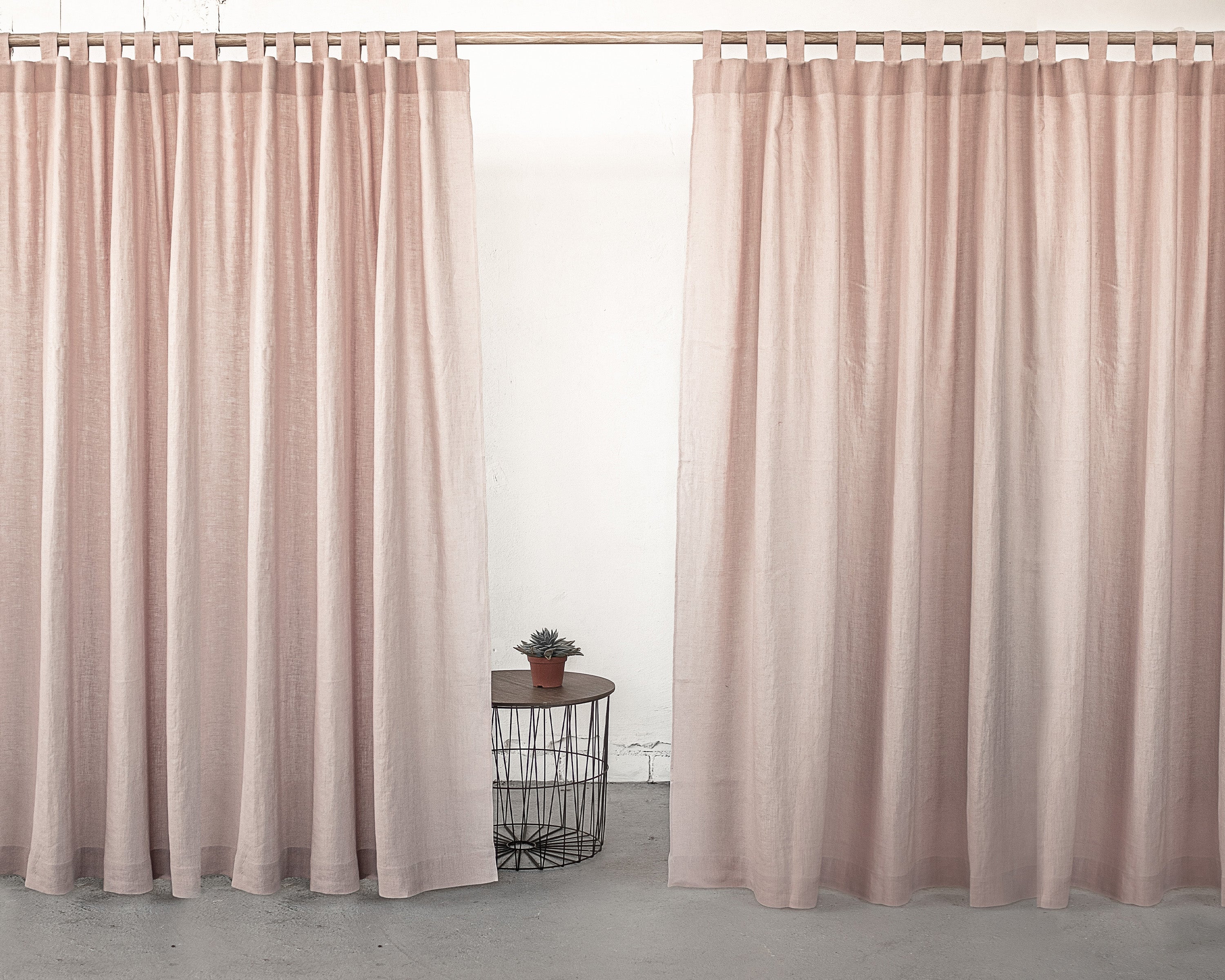 Dark plum linen curtain with tab top design from Magenta Sugarplum, showcasing its rich color and textured fabric for home decor.