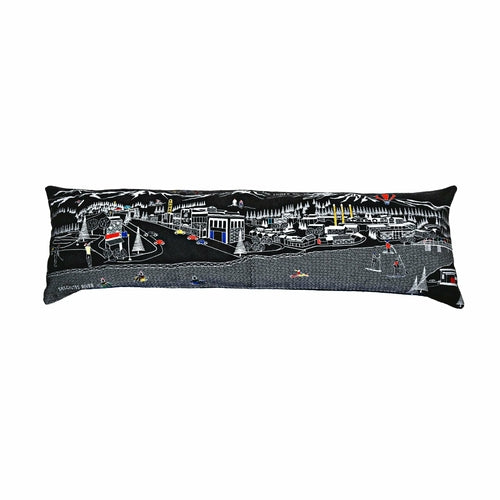 Orchid Apple Bend Pillow in vibrant fabric, used as stylish home decor cushion on a sofa or bed.