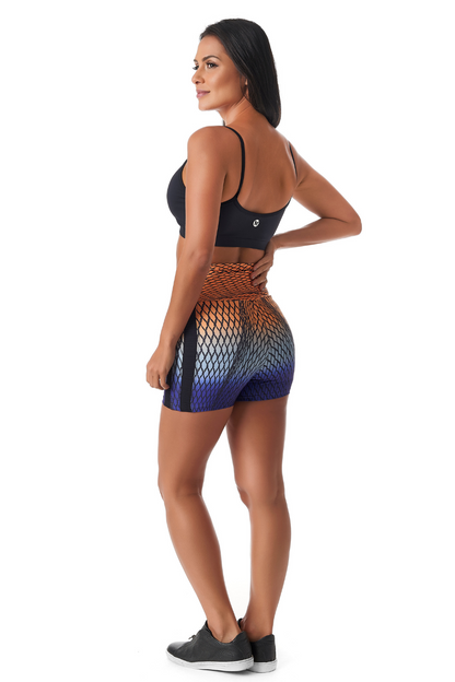 Red Medusa Spiral Booty Shorts in vibrant activewear fabric, featuring a spiral design and snug fit for workout and casual wear.