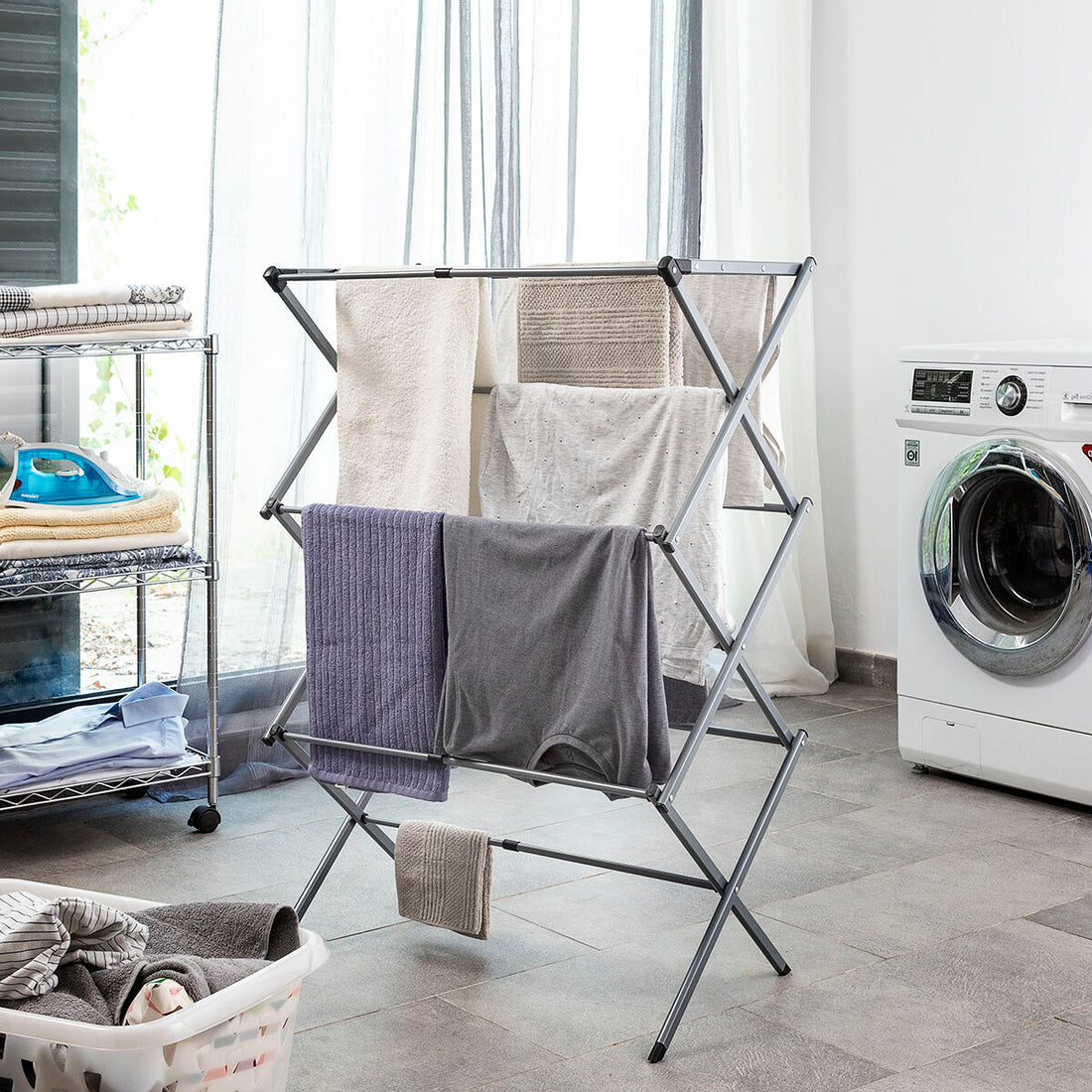 Metal folding and extendable clothes dryer with 3 levels, perfect for home and garden use by Bigbuy.