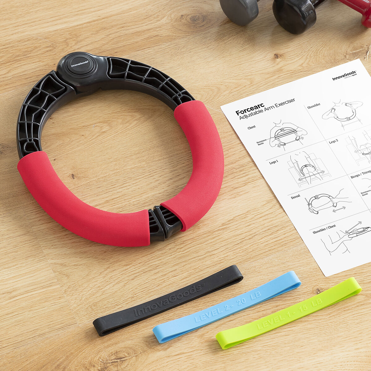 Adjustable arm exerciser with resistance bands and exercise guide by Bigbuy, suitable for strength training and rehabilitation.