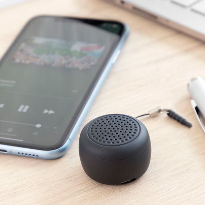 Rechargeable portable wireless mini speaker by Miund InnovaGoods, showing compact design and control buttons.