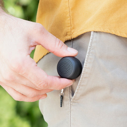 Rechargeable portable wireless mini speaker by Miund InnovaGoods, compact consumer electronics device with speaker grille and control buttons.