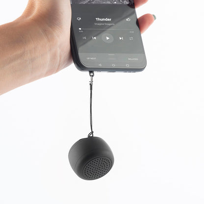Rechargeable portable wireless mini speaker by Miund InnovaGoods in black, showing compact design with control buttons and speaker grille.
