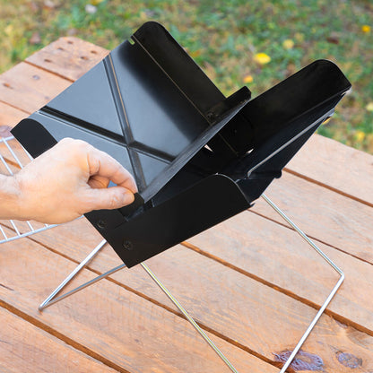 Portable folding charcoal barbecue grill by Bigbuy, compact garden barbecue for outdoor cooking and easy transport.