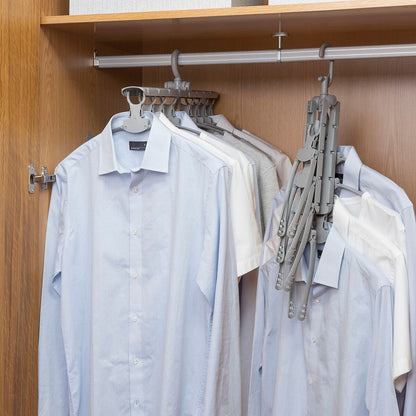 Multi-function 8-in-1 furniture hanger by InnovaGoods, with various hooks and compartments for organizing clothes and accessories.