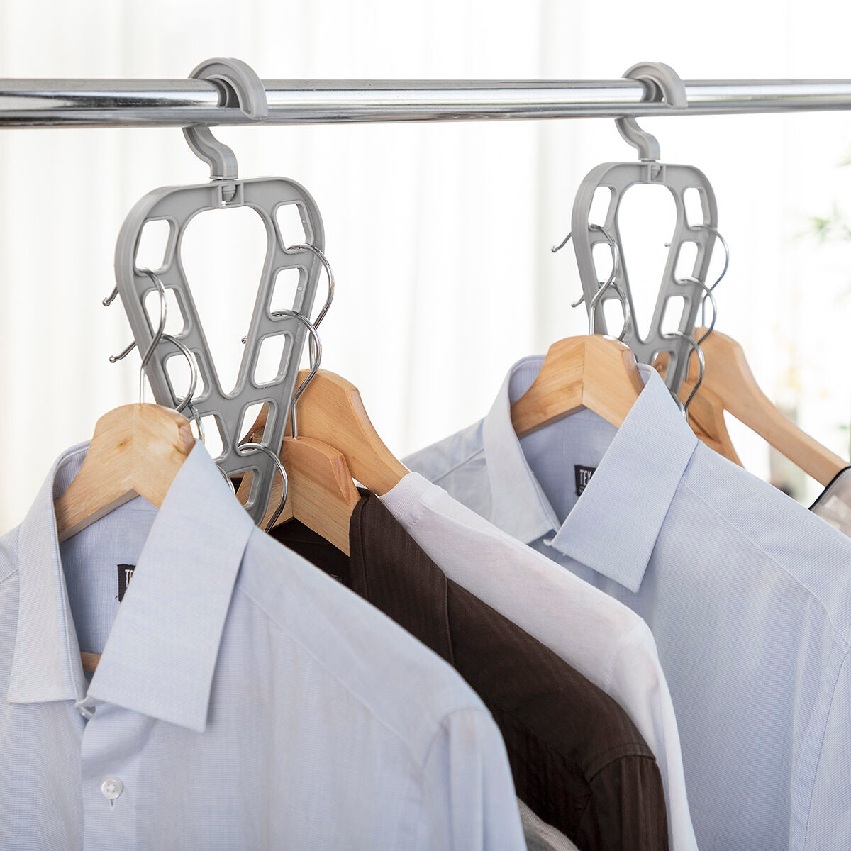 Set of two Orzer InnovaGoods hanger organizers by Bigbuy, showcasing sleek furniture storage solutions with multiple compartments.