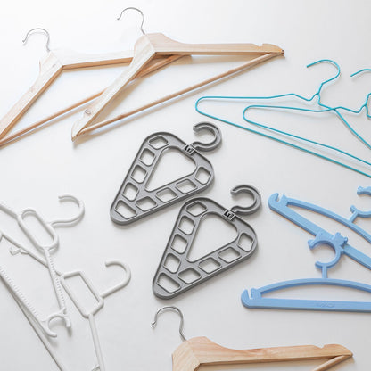 Set of two Orzer InnovaGoods hanger organizers from Bigbuy, showcasing sleek plastic storage solutions for closet organization.