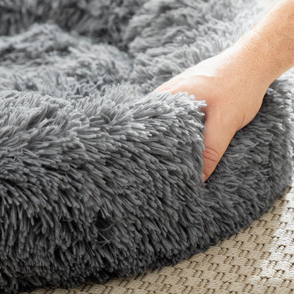 Large round Bepess InnovaGoods anti-stress pet bed for pets, 60 cm diameter, soft and comfortable for relaxation.