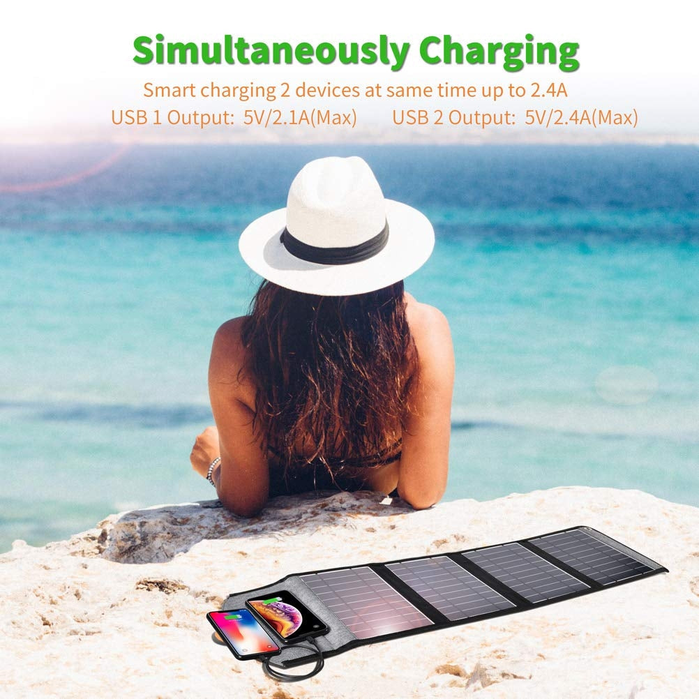Ultramarine Dione CHOETECH SC005 22W waterproof foldable solar panel charger with USB ports, outdoors with sunlight glare.