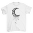 Illustrated moon graphic on Turquoise Theseus T-shirt featuring celestial artwork and moon designs.