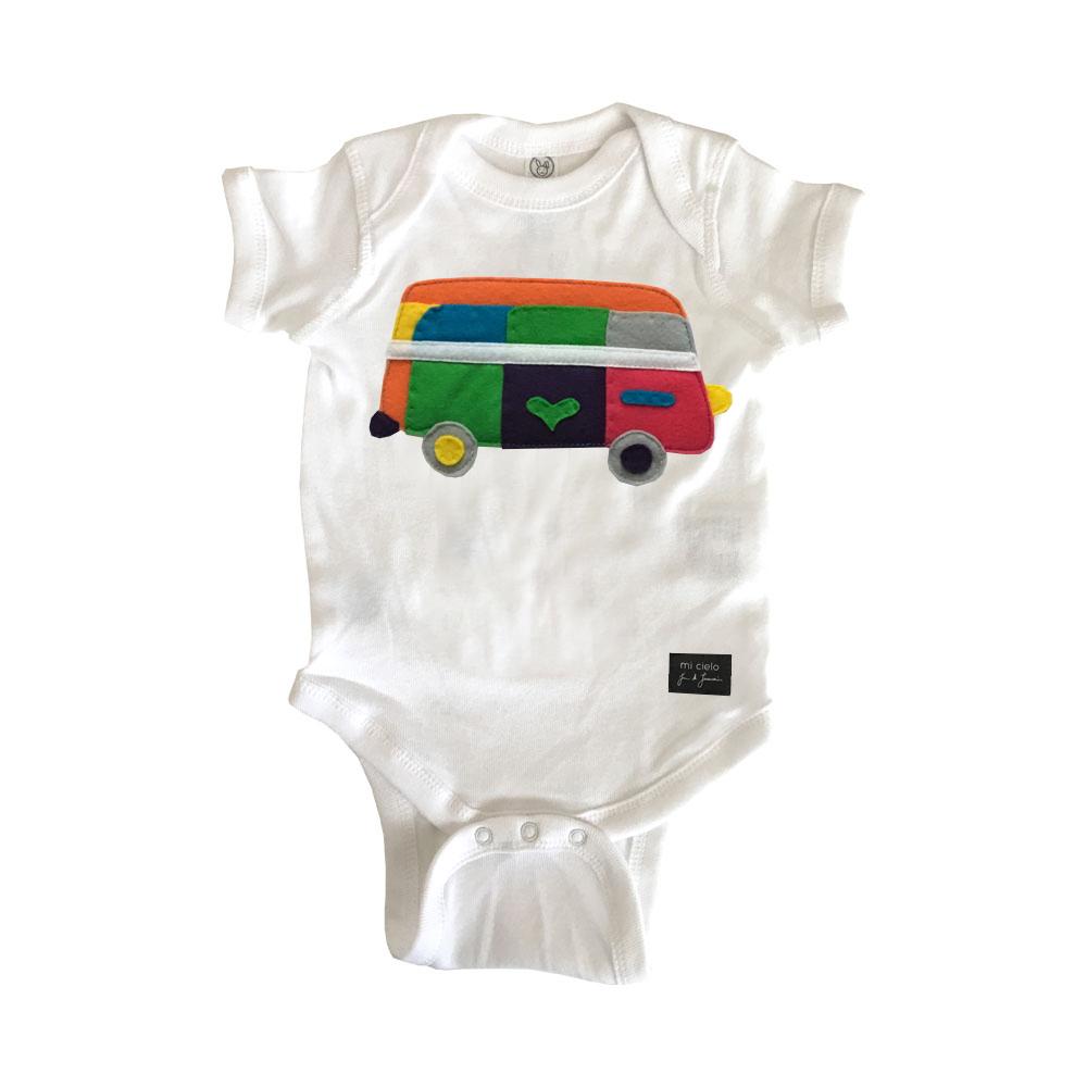 White baby onesie featuring a van print from mi cielo x JUAN DE LASCURAIN by Sky Blue Milo, shown laid flat on a surface.
