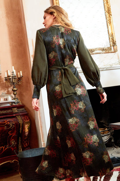 Green long sleeve wrap dress by Blush Athena featuring a V-neck, jacquard fabric, maxi length, and side slit.