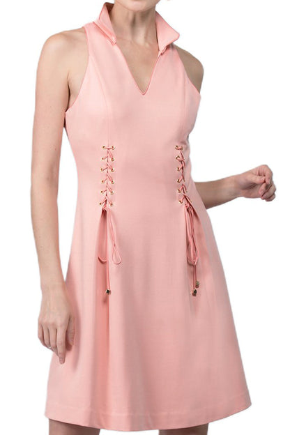 Close-up of Peach Dionysus Vienna Dress featuring a fit and flare style with a wing tip collar and elegant design.