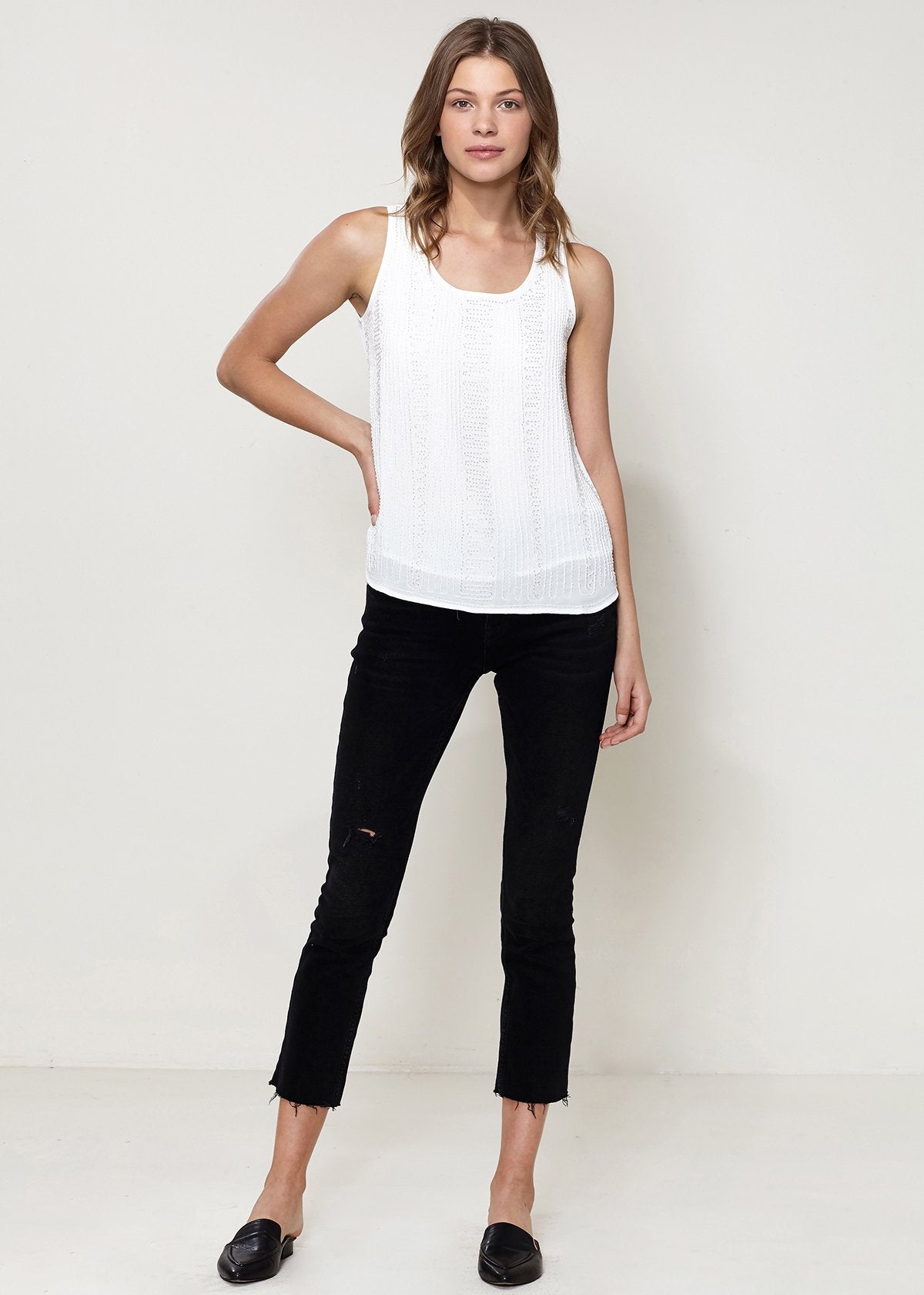 Ivory sleeveless top with embellished accents from Lemon Hera, stylish blouse perfect for casual or dressy wear.