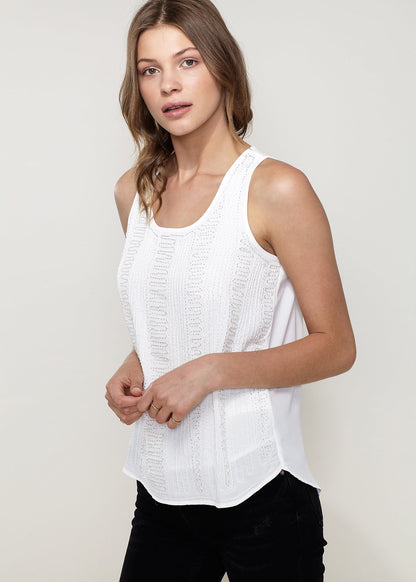 Ivory sleeveless top with embellished accents from Lemon Hera, featuring a stylish and elegant design for casual or dressy wear.