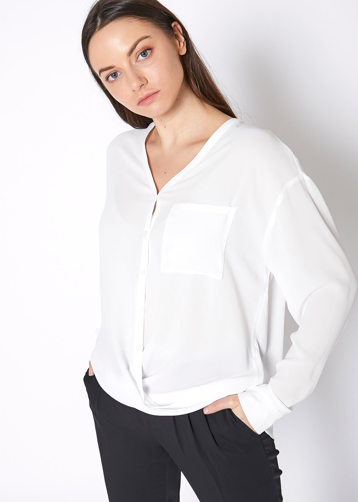 Ivory V-neck wrap hem blouse from Lemon Hera, stylish tops and blouses with a flattering wrap design.