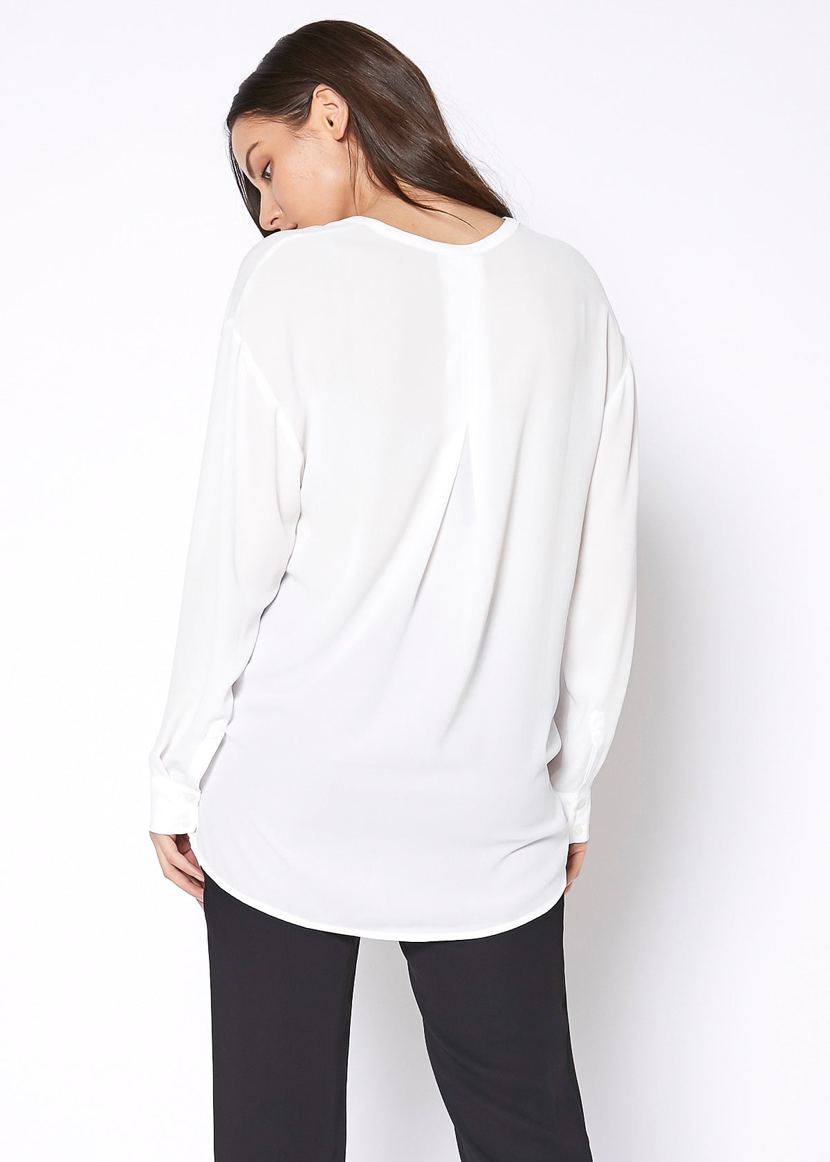 Ivory V-neck wrap hem blouse from Lemon Hera, stylish tops and blouses with a flattering V-neck design and wrap hem detail.