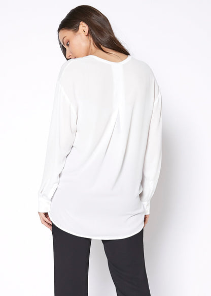 Ivory V-neck wrap hem blouse from Lemon Hera, stylish tops and blouses with a flattering V-neck design and wrap hem detail.