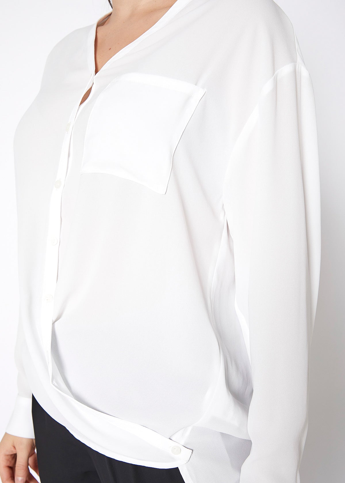 Ivory Lemon Hera V-neck wrap hem blouse with long sleeves and fitted waist, stylish top for casual or office wear.