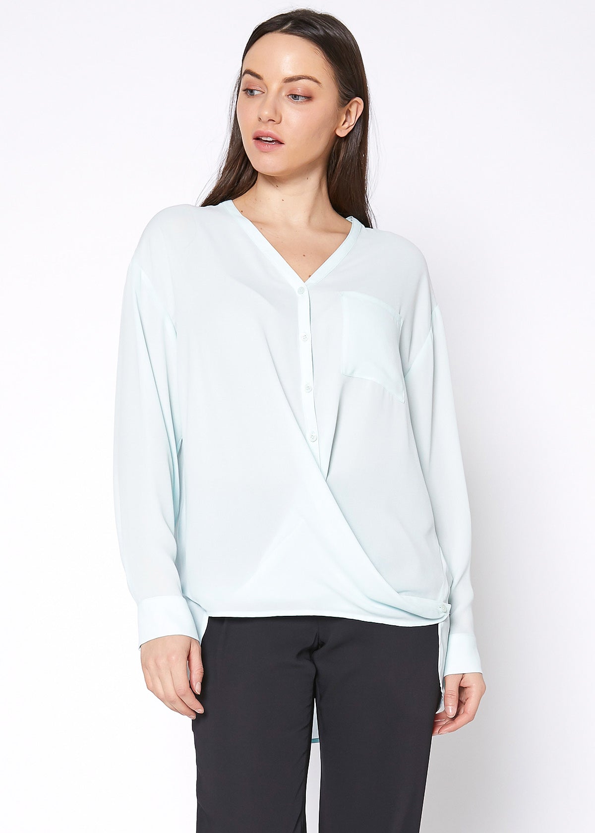 Lemon Hera V-neck wrap hem blouse in peppermint green, featuring a stylish V-neck and draped wrap design.