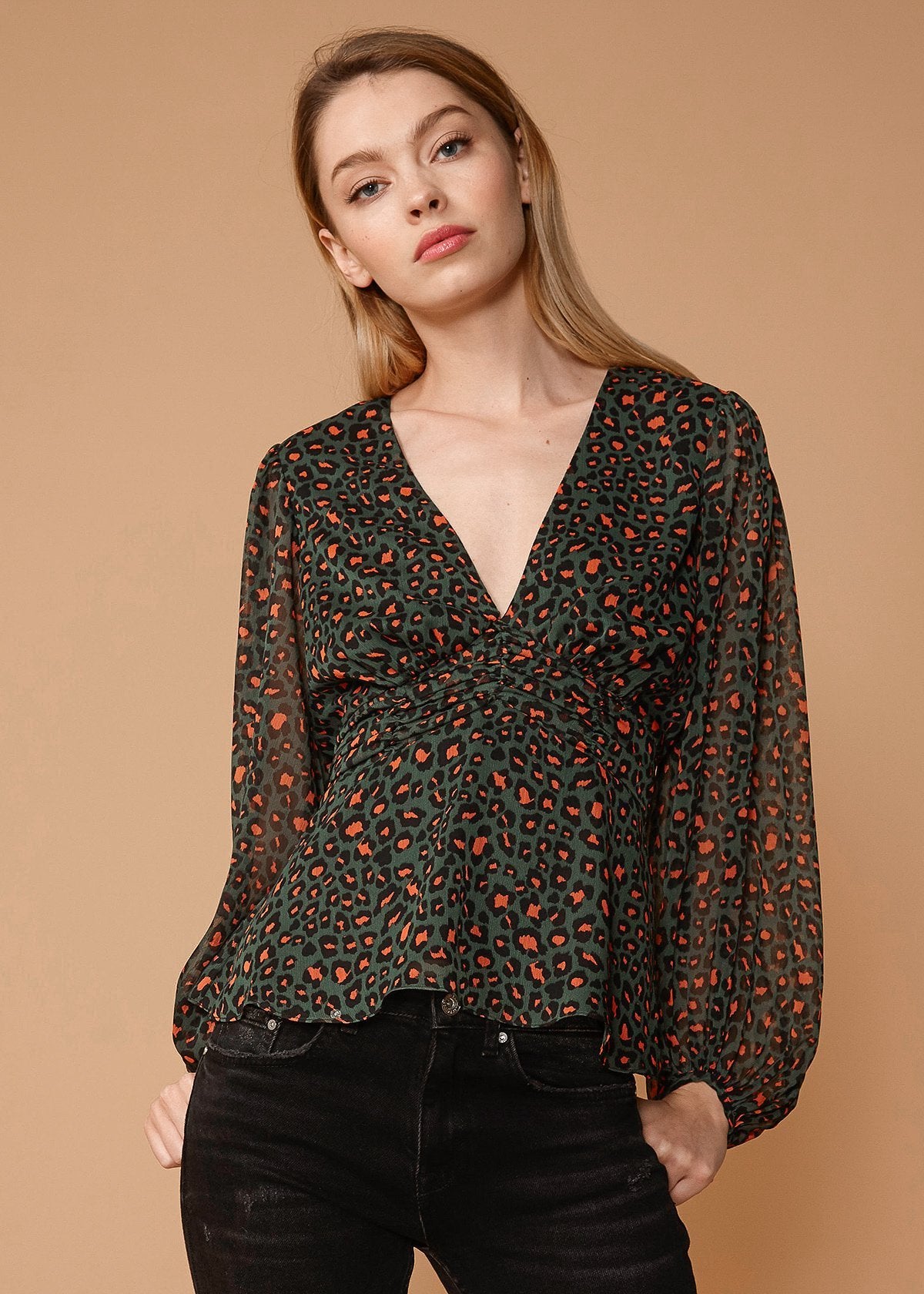 Leopard print V-neck puff sleeve blouse by Lemon Hera, stylish tops and blouses with a trendy animal pattern.