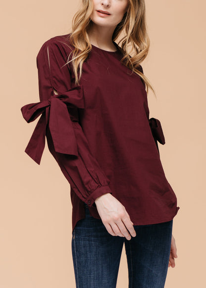 Women’s burgundy tie sleeve poplin blouse by Lemon Hera, featuring a stylish neckline and classic fit, ideal for casual or office wear.