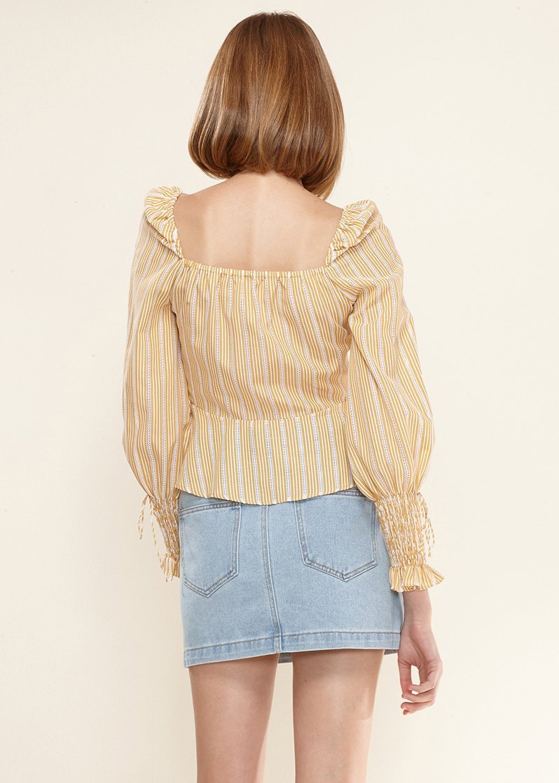 Yellow smocked cuff button-front peplum blouse by Lemon Hera, featuring stylish design and feminine details.