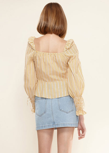 Yellow smocked cuff button-front peplum blouse by Lemon Hera, featuring stylish design and feminine details.