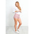 White long sleeve crew T-top for women by Azure Theseus, featuring a simple, classic crew neckline and fitted design.