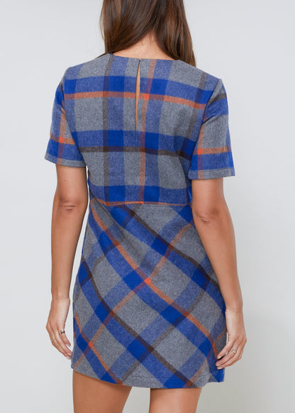 Buffalo plaid wool blend tee dress by Lemon Hera, featuring a casual fit, long sleeves, and classic red, black, and white checkered pattern.