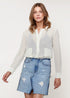 Lemon Hera sheer button-up blouse in light fabric with long sleeves and a classic collar, perfect for stylish casual wear.