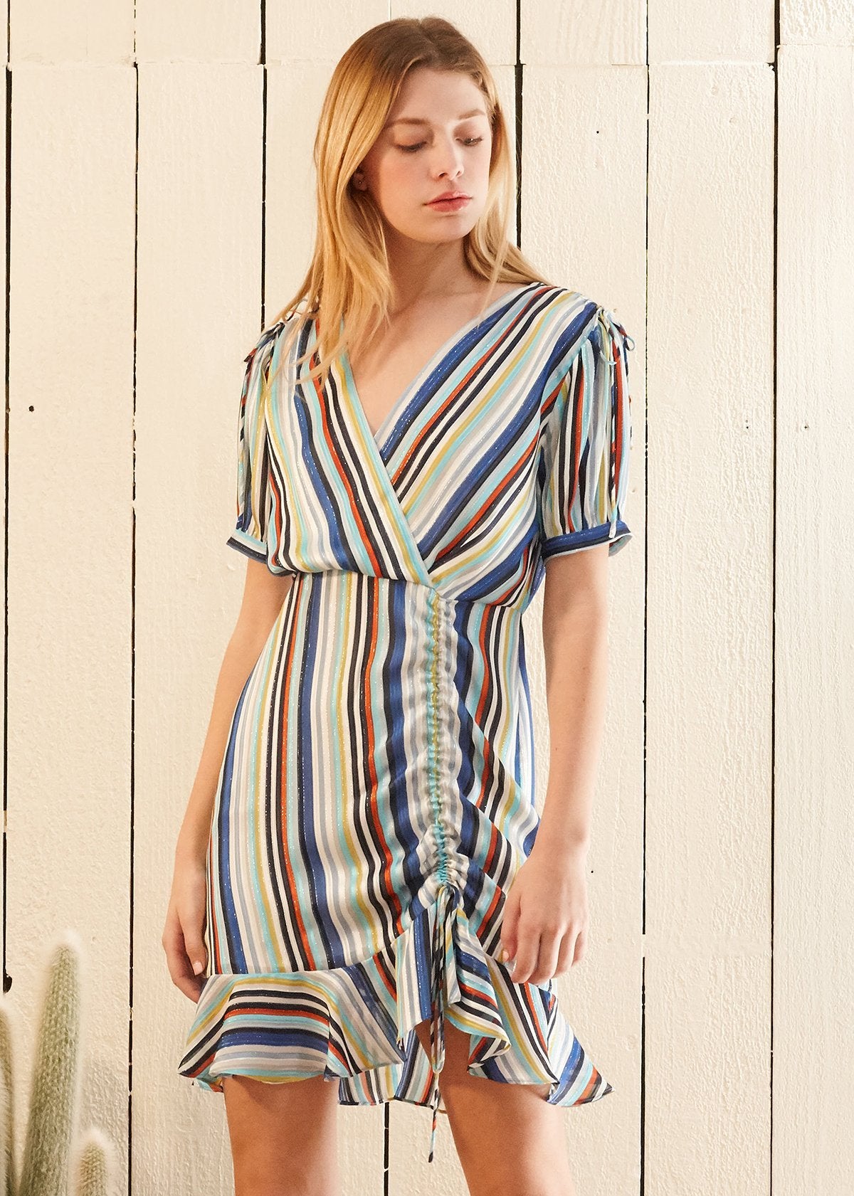 Multi-color ruched dress from Lemon Hera featuring a stylish beach-ready design, perfect for summer occasions.