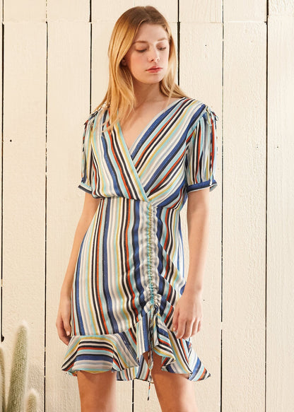 Multi-color ruched beach dress by Lemon Hera featuring vibrant fabric and stylish design, perfect for summer beachwear.