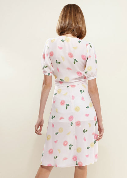 Fruit Punch tie hem open front blouse by Lemon Hera, featuring vibrant color, lightweight fabric, and stylish design.