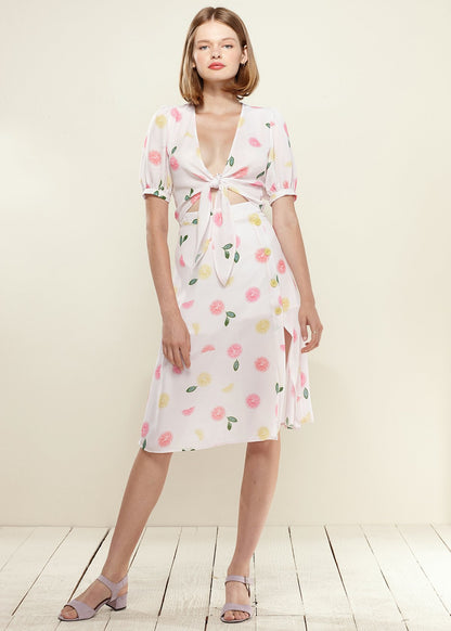 Lemon Hera button front midi skirt in vibrant Fruit Punch color, featuring a stylish midi length and front button details.