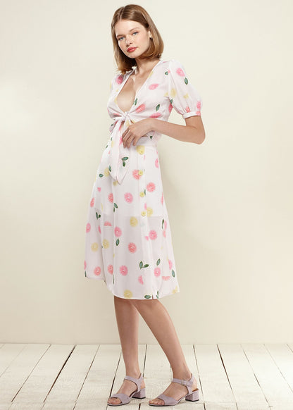 Lemon Hera button front midi skirt in vibrant Fruit Punch color, featuring a stylish midi length and button details.