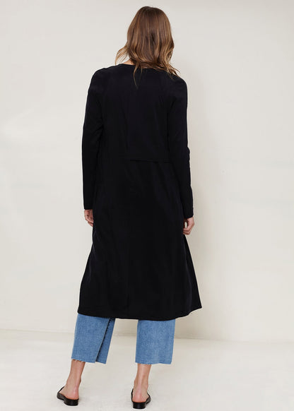 Women’s black wrap trench coat from Lemon Hera, stylish jacket with classic design and tie waist, shown on a model.